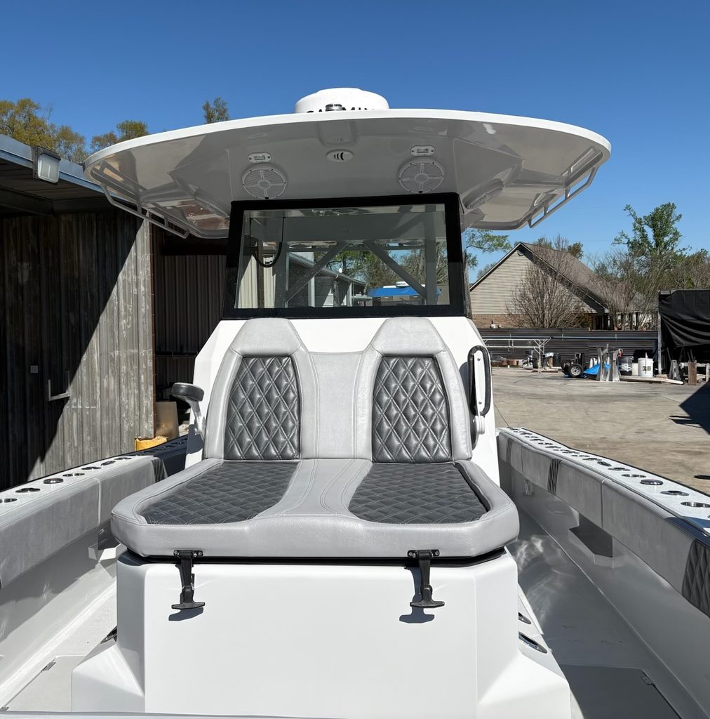 Custom gray and black marine upholstery installed on boat seating